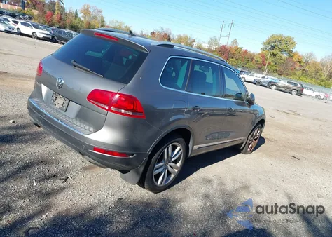 2012 Volkswagen Touareg Vr6 Executive z USA, uszkodzony, nr VIN WVGFF9BP3CD002132